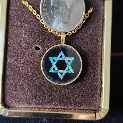 Sale Photo Thumbnail #284: Stamped 585 gold
black enamel with opal inset