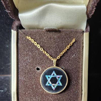 Sale Photo Thumbnail #285: Stamped 585 gold
black enamel with opal inset