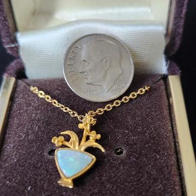 Sale Photo Thumbnail #293: Gold filled necklace with opal inset in the vase shape /  flowers.