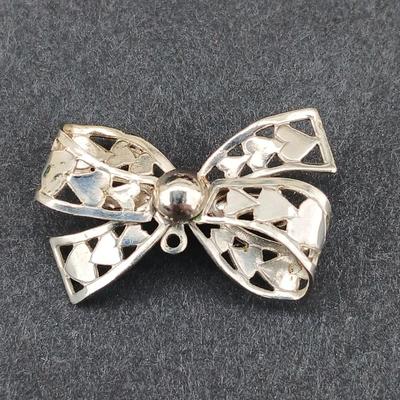 Watch it stretch band women's watch with two brooch pins - Silver toned brooch and bow brooch