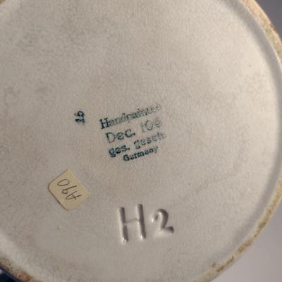 Sale Photo Thumbnail #147: Vintage Hand Painted Ges Gesch Germany Porcelain Storage Box with Lid- Approx 5 1/2" in Diameter.  Item has chipping and discoloration- please see all pictures.