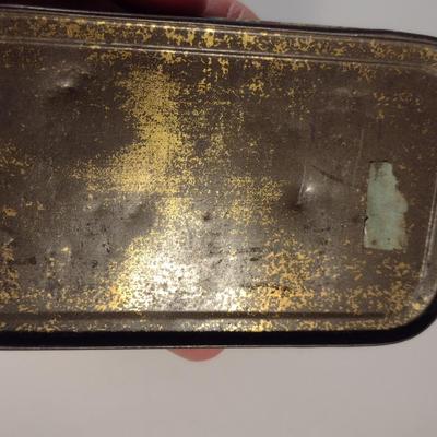 Sale Photo Thumbnail #175: Antique Lucky Strike Tobacco Tin- Circa 1920's- Approx 4 1/4" x 2 3/4" x 1 1/4" Tall.  Please see all pictures for condition.