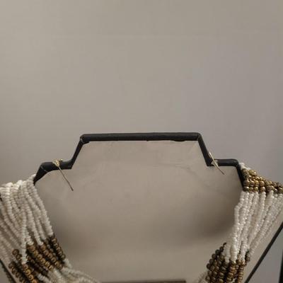 Long multi strand beaded necklace with earrings