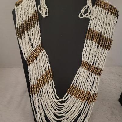 Long multi strand beaded necklace with earrings