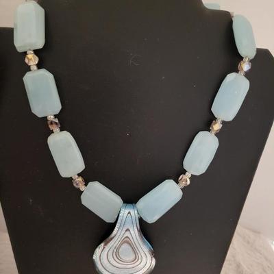 Polished stone and glass necklace