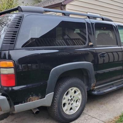 Sale Photo Thumbnail #3: 2004 chevy suburban z71. Mechanic special. Runs. Drives. does not stop. Will need to be trailered from the 25th st s and main ave area of Fargo.  
Sold as is.  Break Line broke and was unable to fix due to hand surgery.  Boxes in the back are the break li