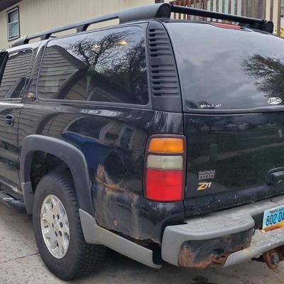 Sale Photo Thumbnail #4: 2004 chevy suburban z71. Mechanic special. Runs. Drives. does not stop. Will need to be trailered from the 25th st s and main ave area of Fargo.  
Sold as is.  Break Line broke and was unable to fix due to hand surgery.  Boxes in the back are the break li