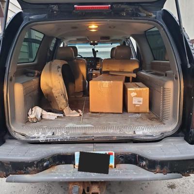 Sale Photo Thumbnail #13: 2004 chevy suburban z71. Mechanic special. Runs. Drives. does not stop. Will need to be trailered from the 25th st s and main ave area of Fargo.  
Sold as is.  Break Line broke and was unable to fix due to hand surgery.  Boxes in the back are the break li