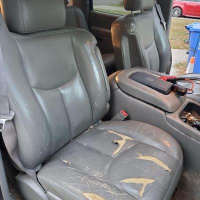 Sale Photo Thumbnail #11: 2004 chevy suburban z71. Mechanic special. Runs. Drives. does not stop. Will need to be trailered from the 25th st s and main ave area of Fargo.  
Sold as is.  Break Line broke and was unable to fix due to hand surgery.  Boxes in the back are the break li