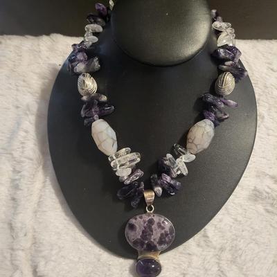 Sterling Amethyst and moon stone necklace pendant by itself is 26 g