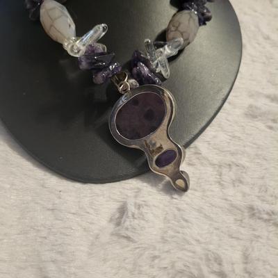 Sterling Amethyst and moon stone necklace pendant by itself is 26 g