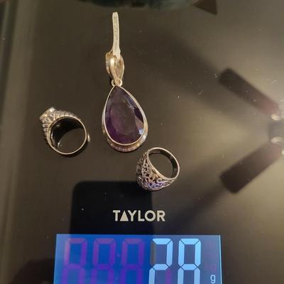 2 Rings and pendant 925 28 g total Ring sizes 6 1/2 and 5 Stone is amethyst