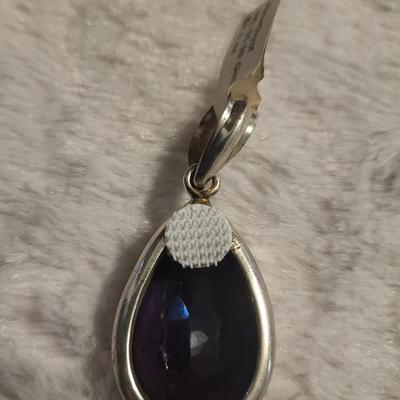 2 Rings and pendant 925 28 g total Ring sizes 6 1/2 and 5 Stone is amethyst