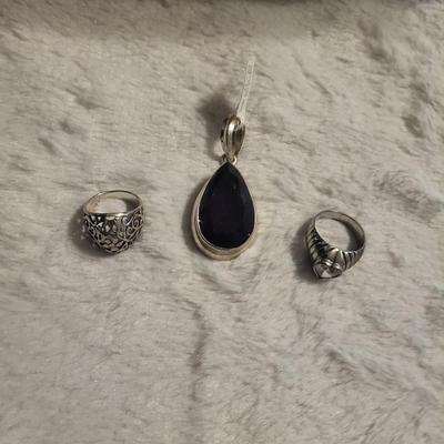 2 Rings and pendant 925 28 g total Ring sizes 6 1/2 and 5 Stone is amethyst