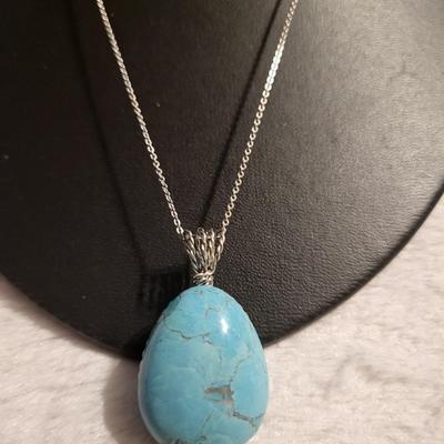 Turquoise stone with sterling necklace and elements. 2 Sterling rings 14 g size 5