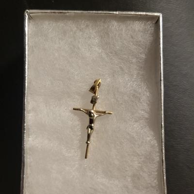 14k Gold cross pendant.