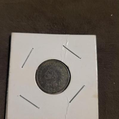 Silver standing quarter can’t read date 1906 Indian head nickel 1956 D wheat penny 1986 Canadian penny