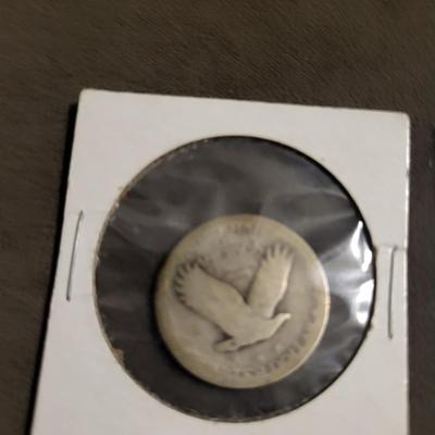 Silver standing quarter can’t read date 1906 Indian head nickel 1956 D wheat penny 1986 Canadian penny