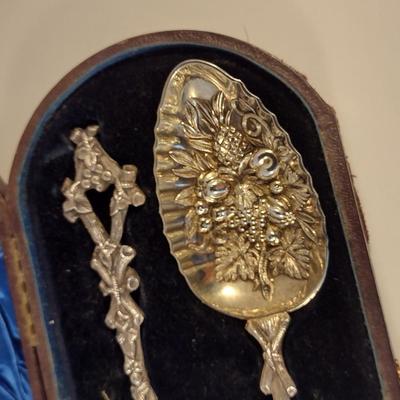 Sale Photo Thumbnail #222: Pair of Antique Repousse' Spoons with Storage Case- Circa 1870.  Items were curated from Scotland for Cannell & Chaffin.