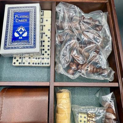 Sale Photo Thumbnail #501: Nice wood box, measures 12" x 12". Games included are: Chess, checkers, backgammon, cards, cribbage, and dominoes.  New condition.