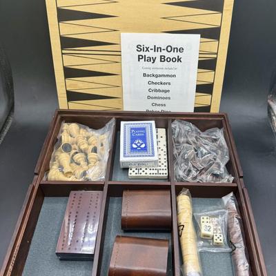Sale Photo Thumbnail #499: Nice wood box, measures 12" x 12". Games included are: Chess, checkers, backgammon, cards, cribbage, and dominoes.  New condition.