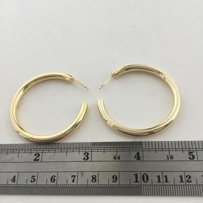 Gold tone hoop fashion earrings