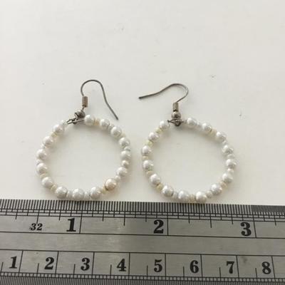 White beaded hoop earrings