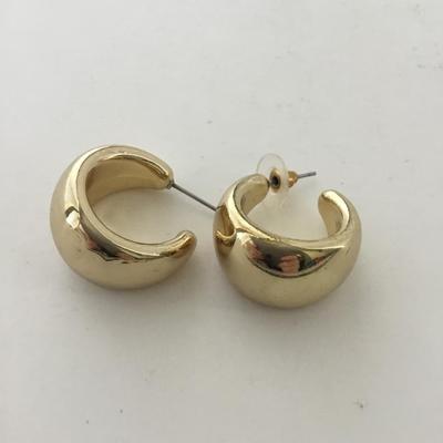 Gold tone statement earrings