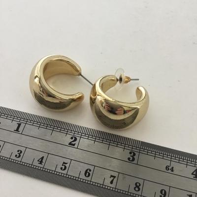 Gold tone statement earrings