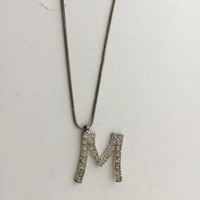 Silver tone letter M charm necklace