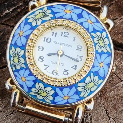 Beautiful Collections Quartz watch with Millefiori-like design and a .925 silver marked Dragonfly pendant