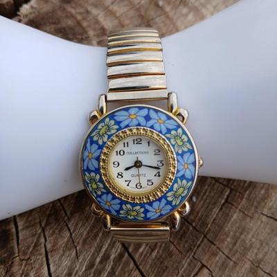 Beautiful Collections Quartz watch with Millefiori-like design and a .925 silver marked Dragonfly pendant