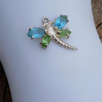 Beautiful Collections Quartz watch with Millefiori-like design and a .925 silver marked Dragonfly pendant