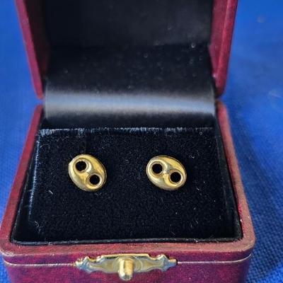 Sale Photo Thumbnail #299: Pierced gold stud earrings
750 stamped