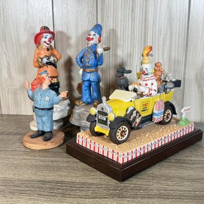 LOT 123B: Ron Lee Clown Car Sculpture w/ 2 Musical Clown Figures: Police & Fire