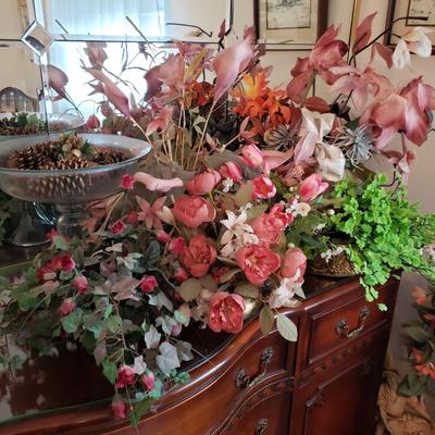 LOT 137D: Large Assortment of Faux Flower Arrangements in Brass Planters, Ceramic Vases & Large Glass Holiday Display Piece