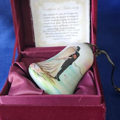 Sale Photo Thumbnail #322: Hand painted glass ornament, in box
Bell Shape, couple embracing in a wedding dance
Comes with COA