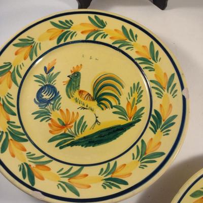 Sale Photo Thumbnail #309: Vintage HB Quimper France Plates- Set of Four- Approx 9 5/8" in Diameter.  Four designs.  Items have chipping- please see all pictures.