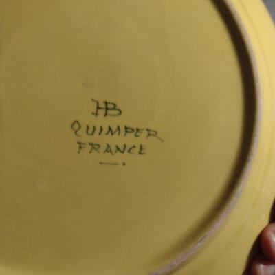 Sale Photo Thumbnail #313: Vintage HB Quimper France Plates- Set of Four- Approx 9 5/8" in Diameter.  Four designs.  Items have chipping- please see all pictures.
