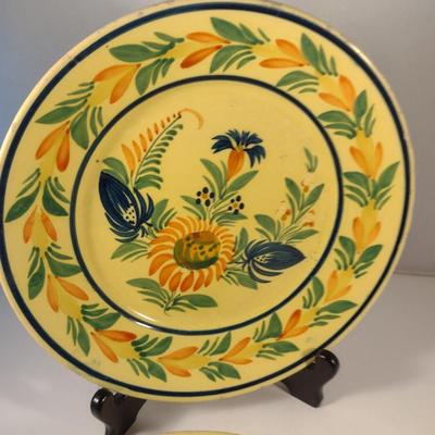 Sale Photo Thumbnail #308: Vintage HB Quimper France Plates- Set of Four- Approx 9 5/8" in Diameter.  Four designs.  Items have chipping- please see all pictures.