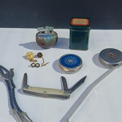 Neat variety of Curio keepsakes - ceramic table lighter - Pill box - vintage tape measure - pocketknife - Burrough's Adding Machine...