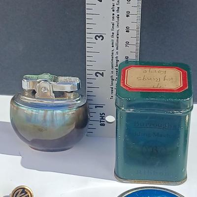 Neat variety of Curio keepsakes - ceramic table lighter - Pill box - vintage tape measure - pocketknife - Burrough's Adding Machine...