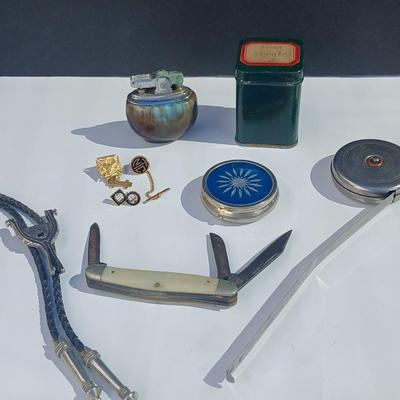 Neat variety of Curio keepsakes - ceramic table lighter - Pill box - vintage tape measure - pocketknife - Burrough's Adding Machine...