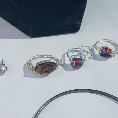 Variety of necklaces, rings, and three Virgin Mary Blue Miraculous pendants
