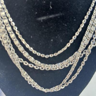Variety of necklaces, rings, and three Virgin Mary Blue Miraculous pendants