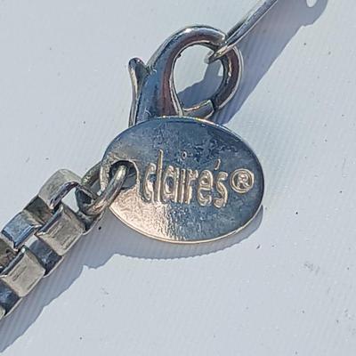 Variety of necklaces, rings, and three Virgin Mary Blue Miraculous pendants