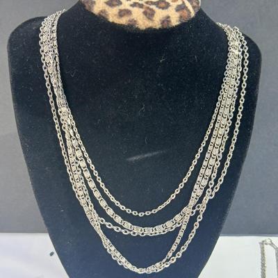 Variety of necklaces, rings, and three Virgin Mary Blue Miraculous pendants