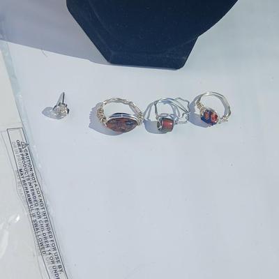 Variety of necklaces, rings, and three Virgin Mary Blue Miraculous pendants