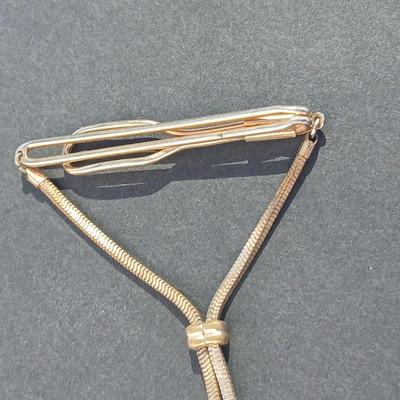 Vintage tie bars, cuff links, and tie clips