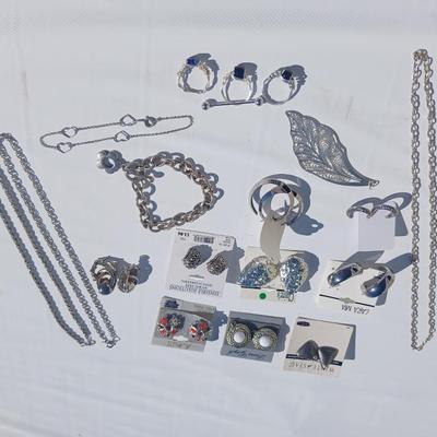 Silver toned earrings, necklaces, pendants and more - all silver in color